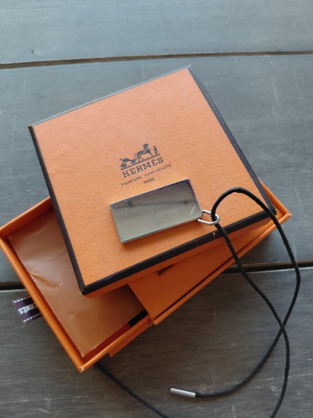 Hermes silver pendant leather cord EUC